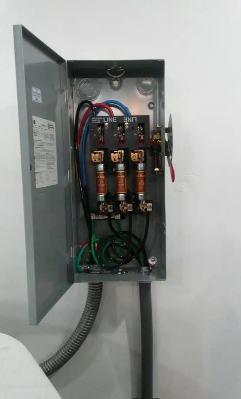 Three-phase disconnect switch installed for Smoke Detector Installation in Oshkosh